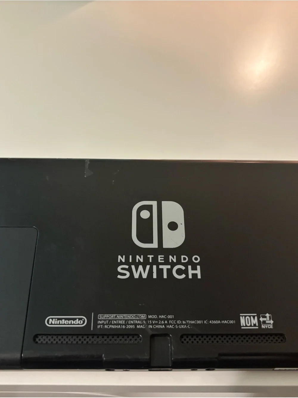 Nintendo Switch with Neon Red and Neon Blue Joy-Con